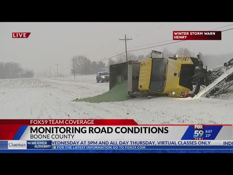 INDOT plow overturns