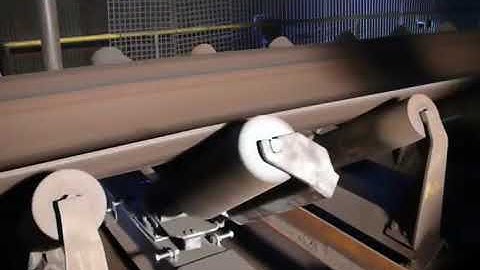 Cơ cấu cân chỉnh lệch băng bằng con lăn.Con lăn điều tâm.Băng tải lõi thép.Băng tải con lăn.