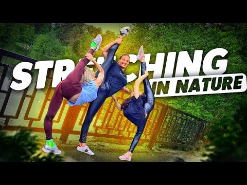 Stretching in Nature. Three FLEXIBLE GIRLS doing a warm-up | FlexShow