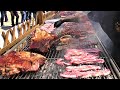 Huge Grills of Argentinian Meat. Asado, Angus, Ribs, Sausages. Street Food in Italy