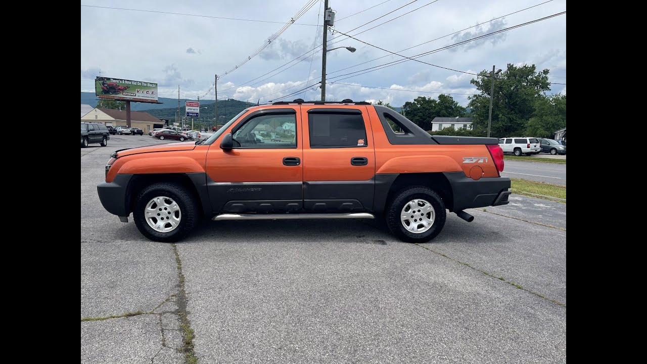 Chevrolet Avalanche faded trim with heat gun and Carworx Refinish