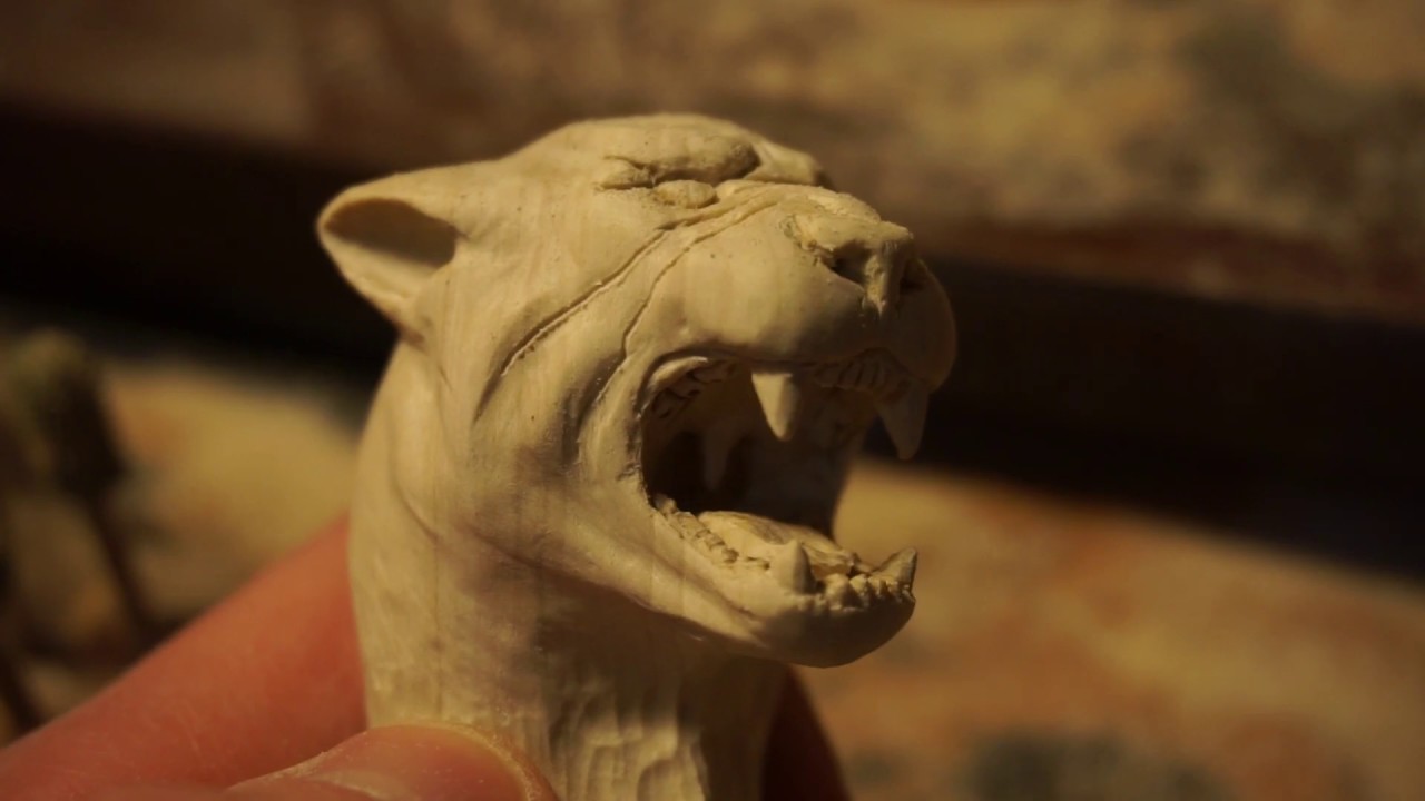 Whittling #Panther out of #wood #woodcarving 