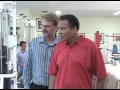 Curtis with Muhammad Ali at his home 2004 (VCR scene)