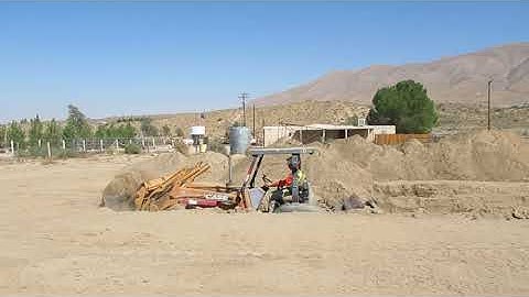 Skip Loader Grader Work By Operator Justin