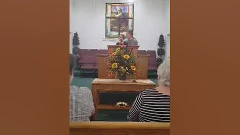Granddaughter Theia singing in church