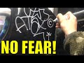 This graffiti writer has no fear