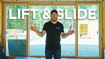 Installing Floor to Ceiling Sliding Glass in Modern Nordic Cabin