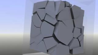 Fractured cube in glass box being rolled