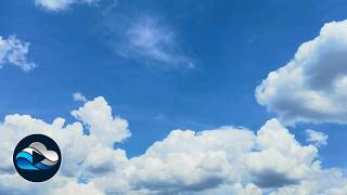 Towering summer clouds adrift in endless blue time lapse, Relax in Nature with Cloud Observe
