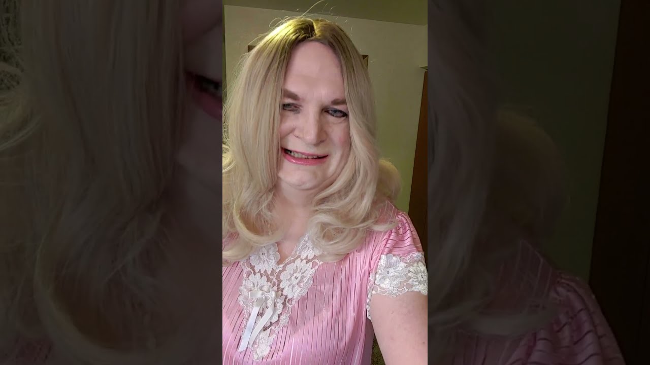Crossdresser Michelle Willmington, modeling my oldest pink slip