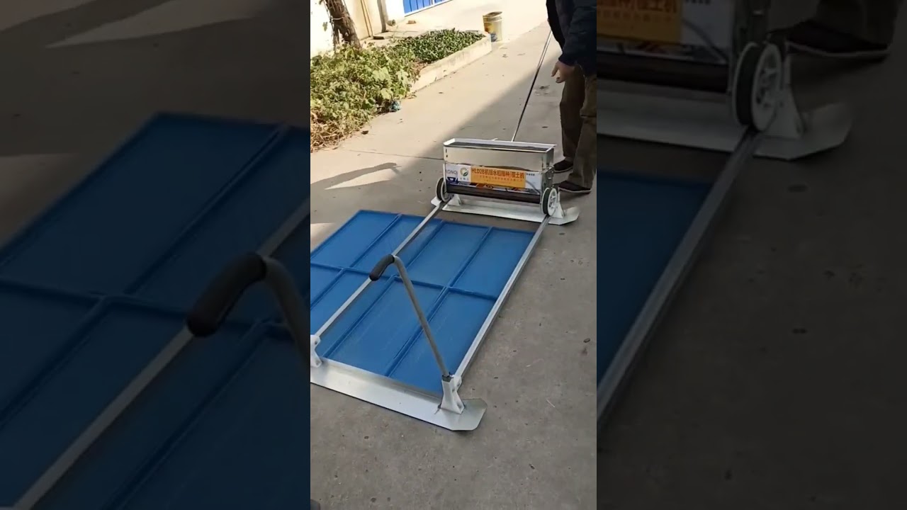 Hand operated hand push type paddy seeding machine or paddy planting machine for sowing trays