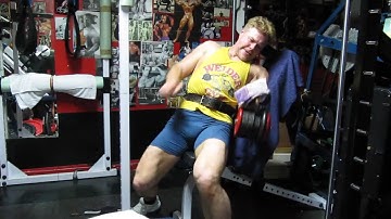 Michael Gundill performs negative biceps curls
