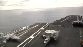 Multiple planes land and take off a moving carrier!