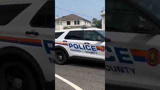 Nassau County police car 803 responding to signal 9