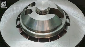 Brake disc turning and grinding machine.