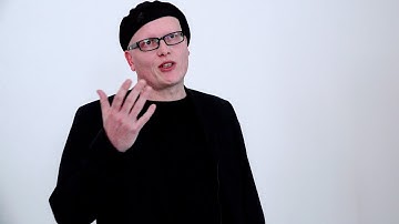 Hochschild cohomology of dg categories, graded centers and spectral sequences Frank Neumann