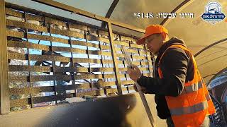 החלפת גופי תאורה בגשר הכהנים על ידי עובדי איחוד ברסלב