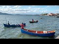 Laguna/,SC, Pescadores com suas bateras e tarrafas, pescando no Centro, próximo ao Mercado Público.