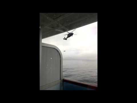 helicopter-hovers-by-cruise-ship-to-collect-coronavirus-testing-kits