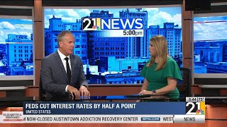 Feds cut interest rate by half a point screenshot 5