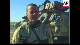 VOICE: US Marines in Kandahar test their firepower after living in the desert