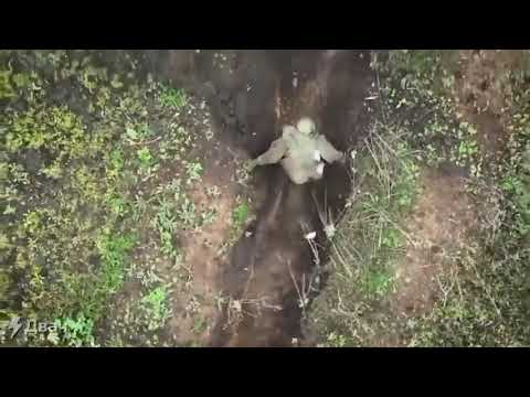 Wounded Russian soldier throws away grenades after drone targets him