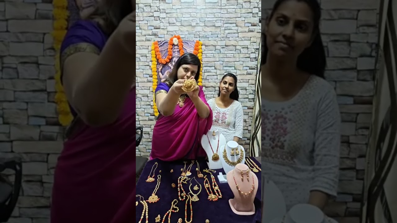 Coral bead necklace set, perfect for adding a pop of color to any outfit. 