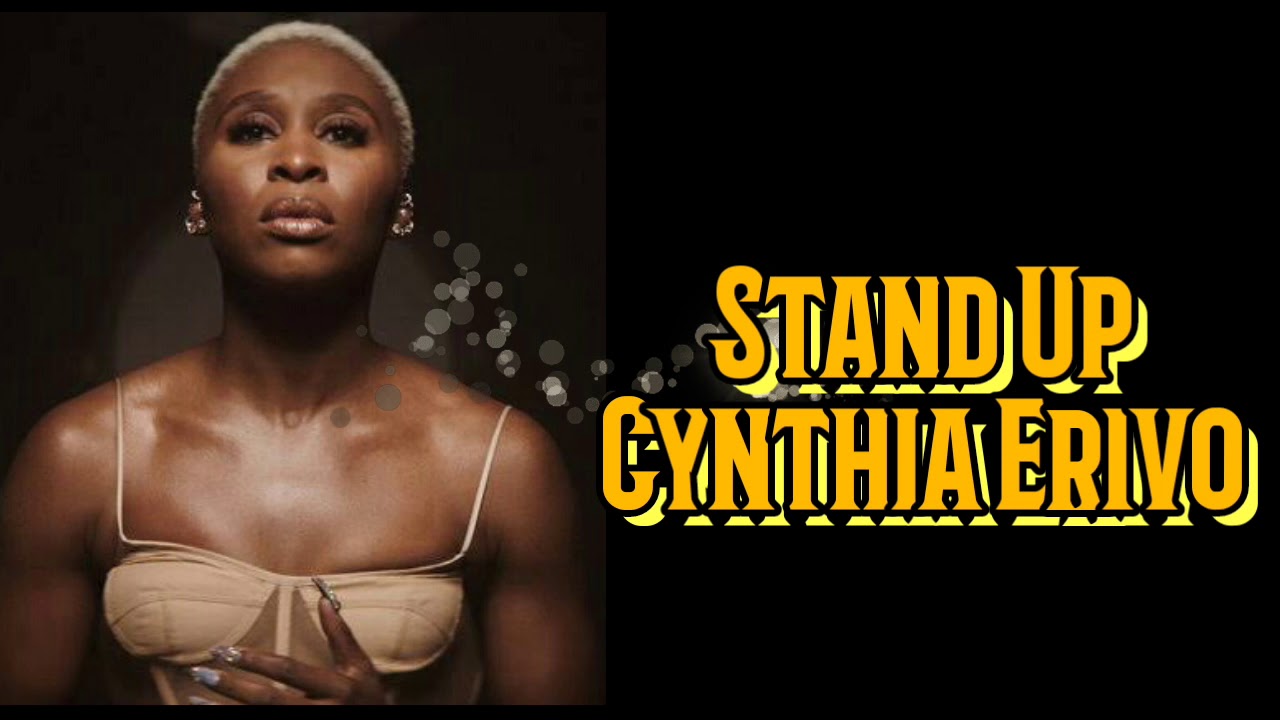 Stand up erivo. Stand up Синтия Эриво. Cynthia Hall певица. Текст Stand up Cynthia Erivo.