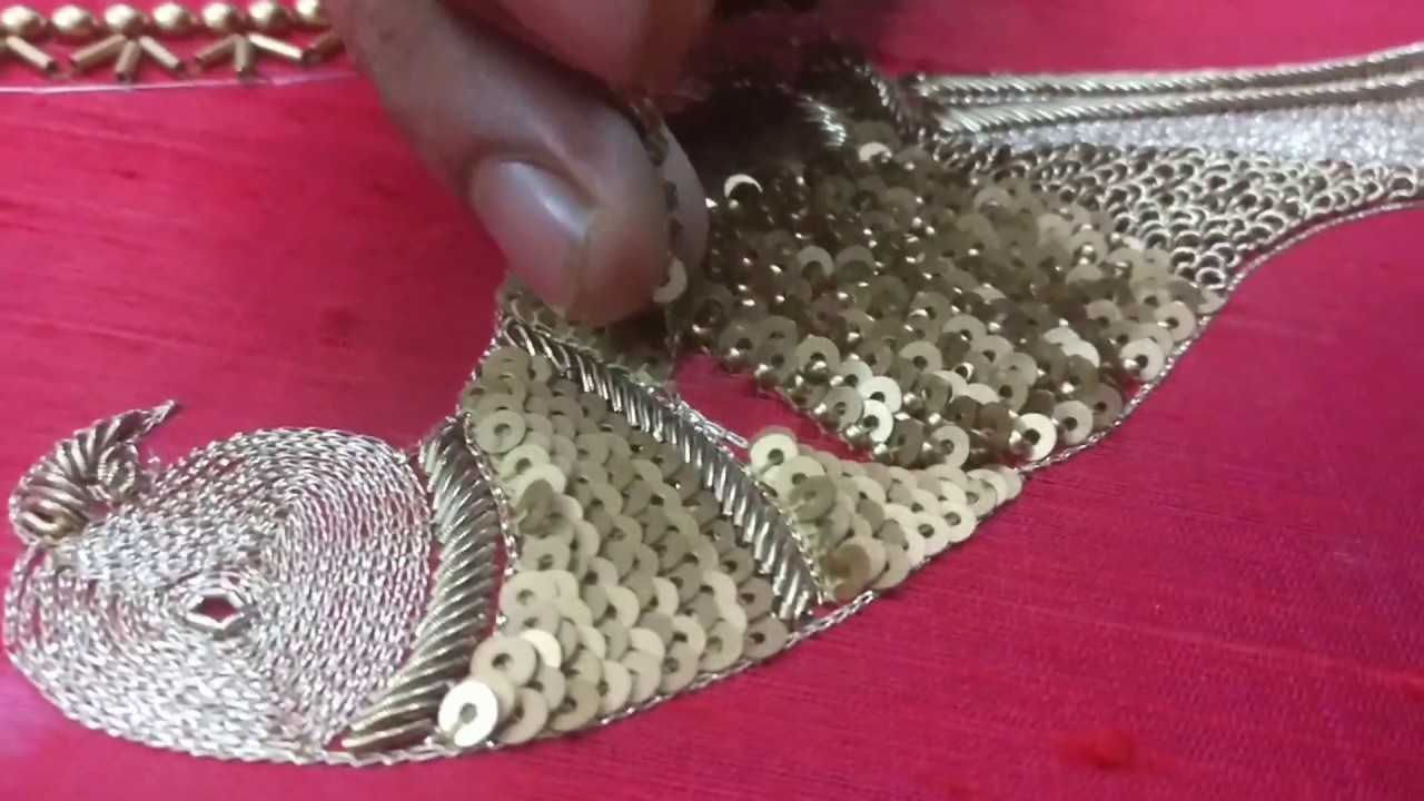 Golden parrot embroidery design on a Saree