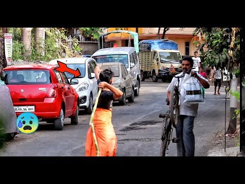 psycho-hitting-stranger's-with-sugarcane-in-india-/prank-in-india