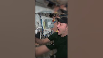 Astronaut shows how to eat ketchup at zero gravity