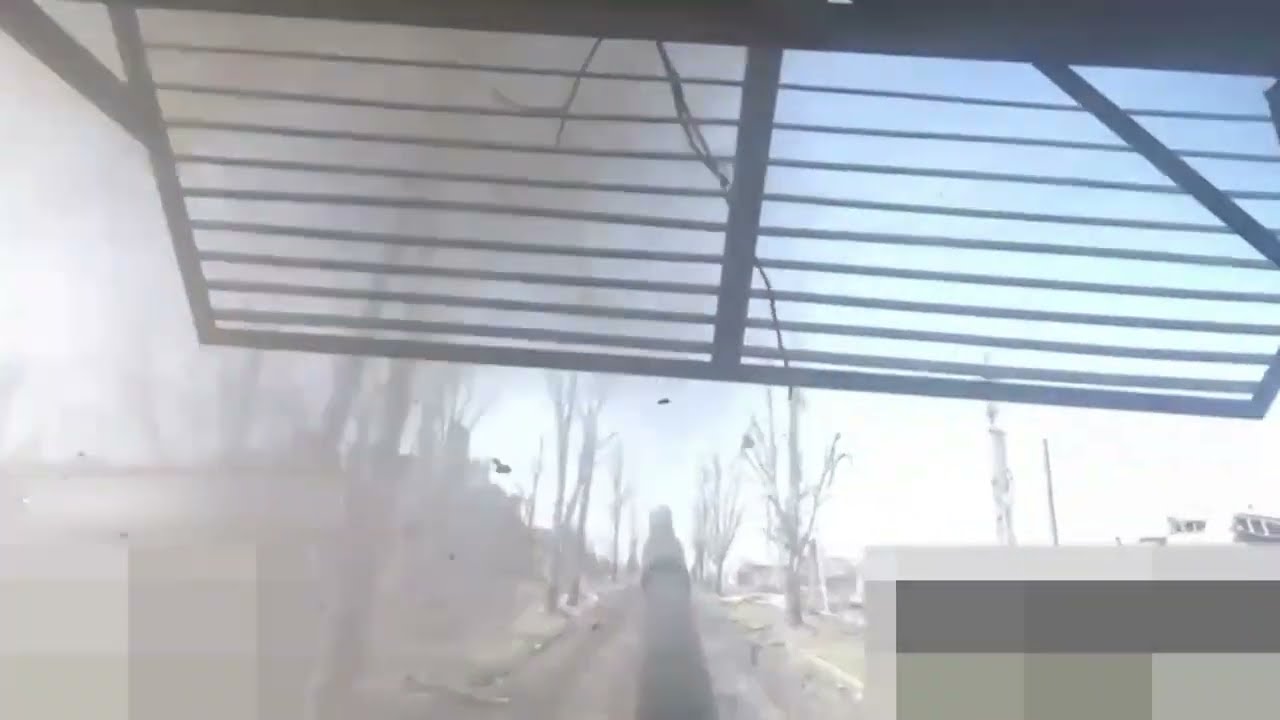 Ukraine - 16.04.2023. Ukrainian FPV Kamikaze Drone Armed With RPG Warhead Hitting Russian Tank.