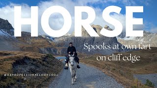 Horse spooks at own fart on cliff edge.