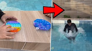 DESAFIO DO FIDGET TOY POP IT NA PISCINA! QUEM PERDER PULA NA PISCINA! - Família Velhote