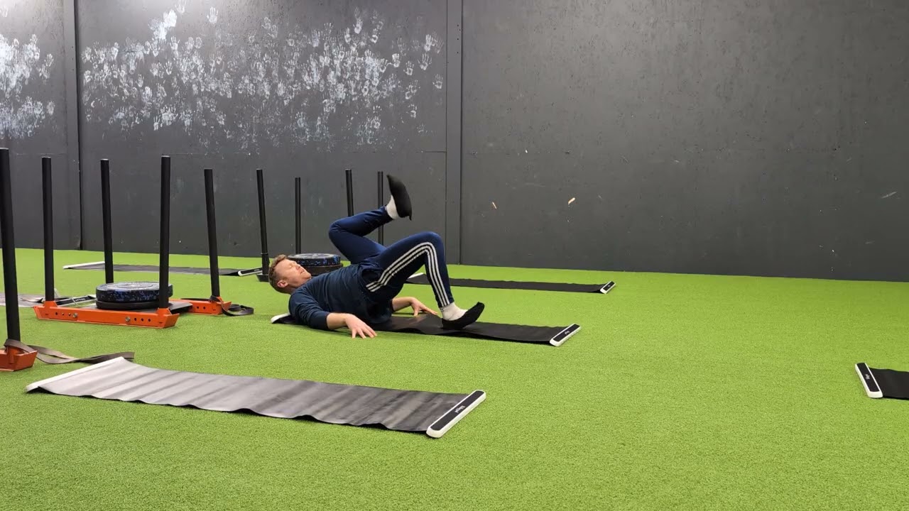One leg eccentric hamstring curls on slide board