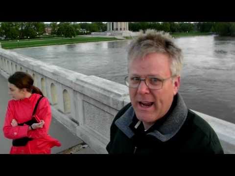 Ed Brumley, and his daughter, Shannon, shoot a video from the Lincoln Memorial Bridge, at Vincennes Indiana, overlooking the flooded Wabash River. Authorities have reported at 7:18 AM today (5-3-2011) that the levee broke were the Embarrass River empties into the Wabash River. Over the next 24 hours the water will backup into Westport Illinois and inundate the few remaining businesses that returned after the devastating flood of 2008. The Lawrenceville Daily Record newspaper stated in tonight's paper, "National Weather Service observer for Lawrence County, Doug Nuttall, reported another .82 inches of rain between 6 pm Monday and 6 am today. Nuttall said the total rainfall for the area since April 10 is now at 15.92."