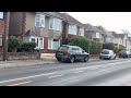 A minibus and a van passing Columbia Road (31/05/2026)