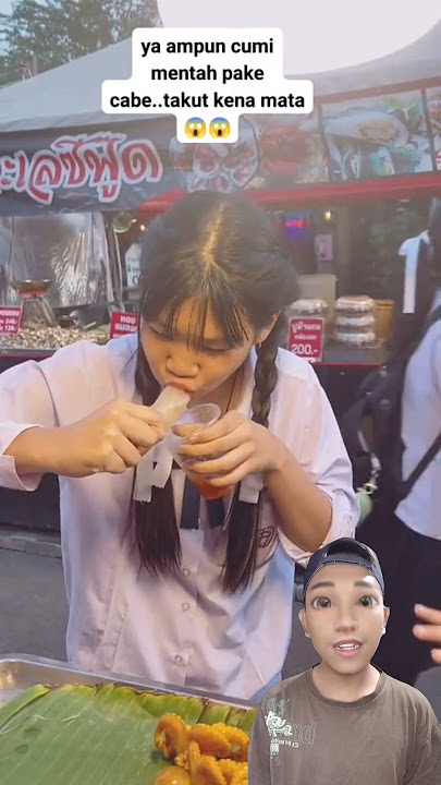 Jajanan extrem makan cumi cumi masih hidup