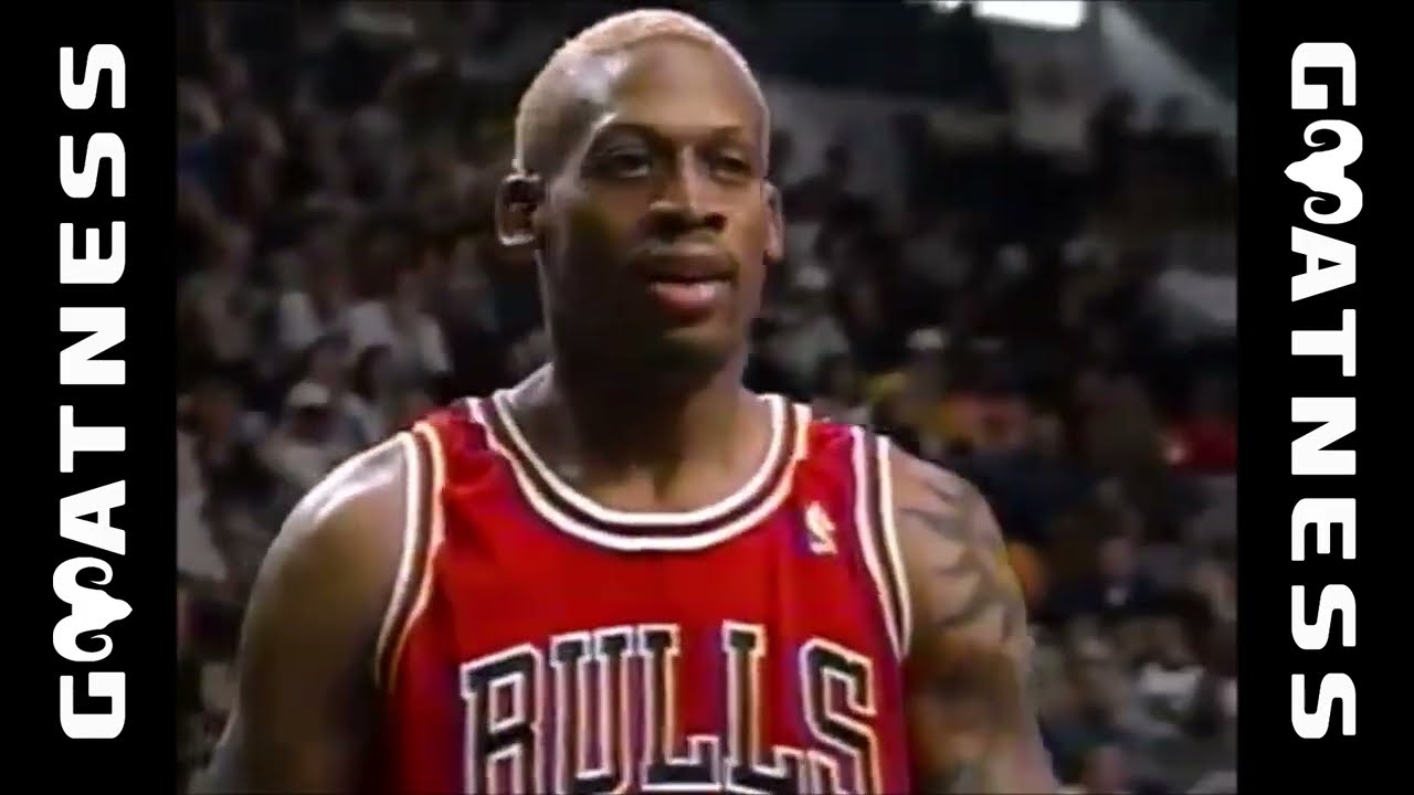 Chicago Bulls - Dennis Rodman #91, Michael Jordan #23, and Scottie Pippen  #33 of the Chicago Bulls look on from the sideline during a 1996 NBA game.