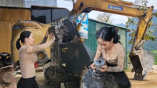 A job not every girl can do. Genius girl alone restores , repairs the main hydraulic pump excavator