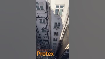 Installing bird netting to deter pigeons in London Mayfair