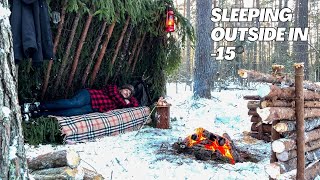 Winter shelter guarantee survival in wild forest! I decided to stay outside at night in -15 degrees