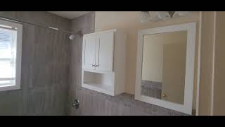 unit 6-2- 1 bedroom, 687sf, second floor, carpet, older renovated kitchen, renovated bathroom.
