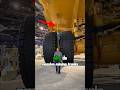Why Mining Trucks Have Chains Hanging Between Their Tires