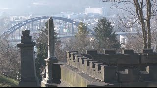 Gravestones restored after vandalism in local historic cemetery