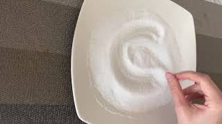Writing numbers in sand tray