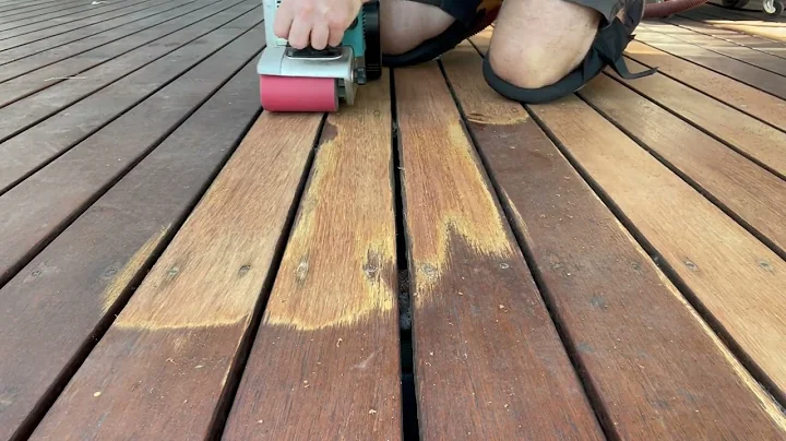 Sanding low spots on a deck with a belt sander…