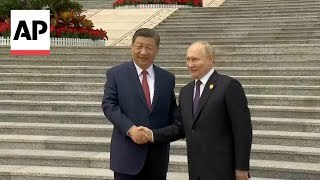 Xi Jinping welcomes Putin as Russian president begins visit to China