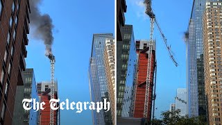 video: Watch: Burning crane collapses and collides with New York building