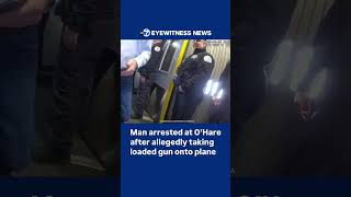 Video shows officers arrest man accused of bringing loaded gun onto plane at O'Hare